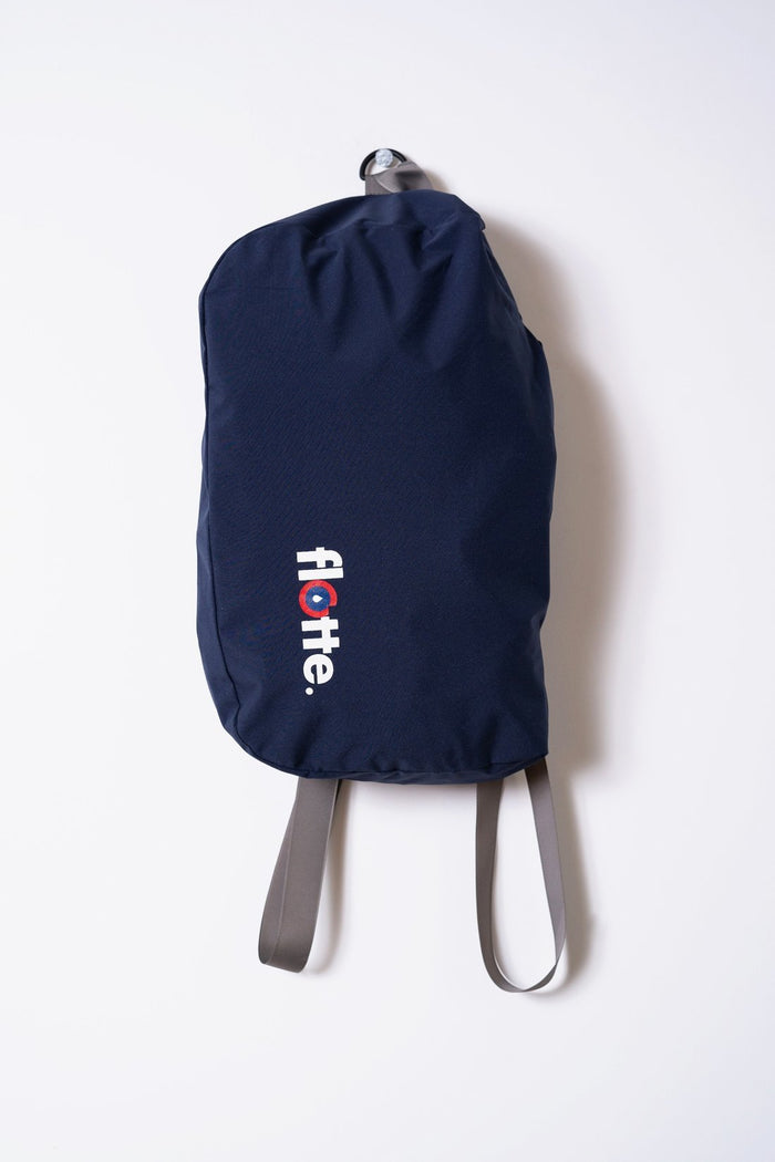 imperméable bleu nuit femme se transforme en sac